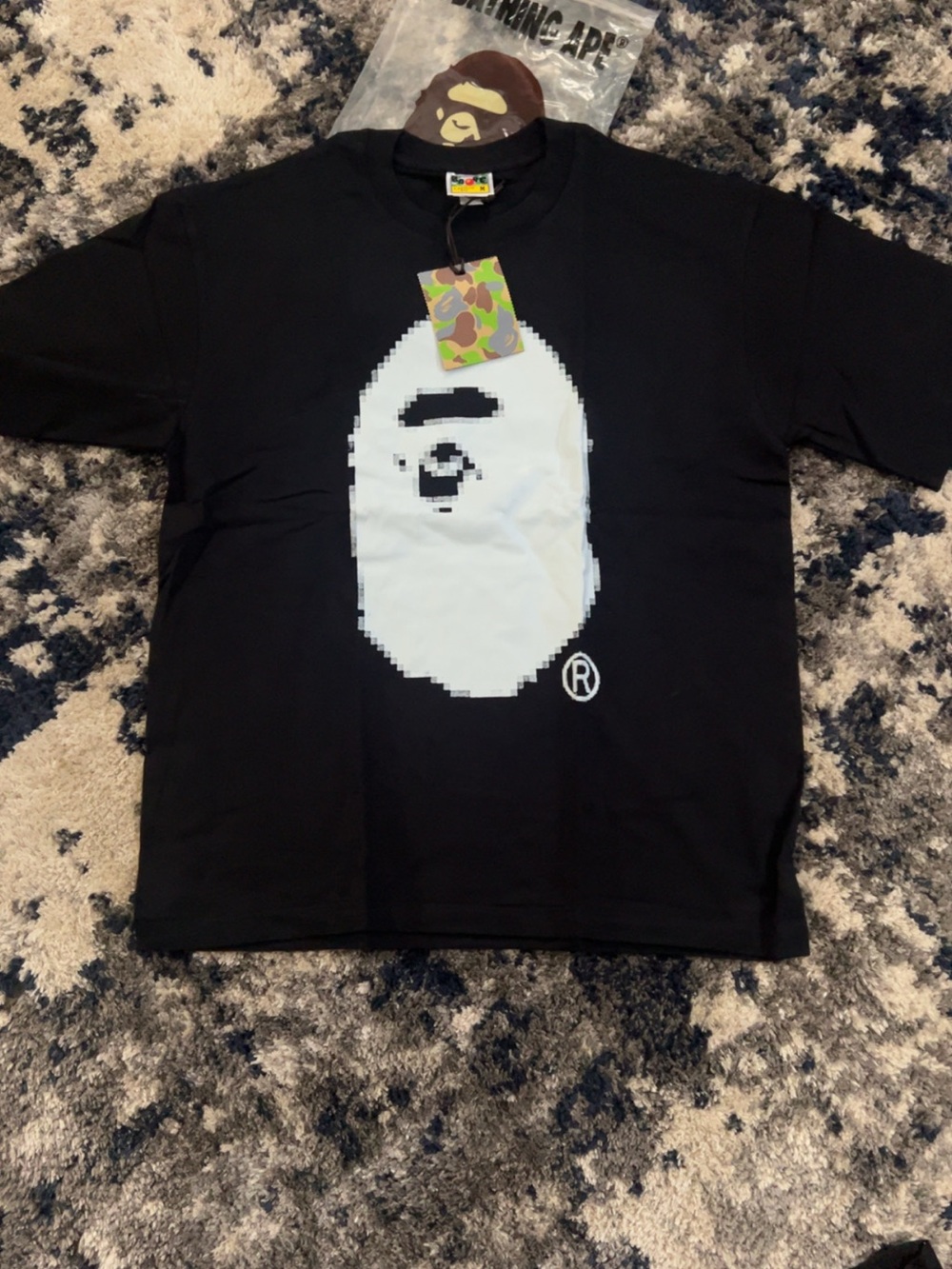 Black “Bathing Ape” Tee with white ape size M